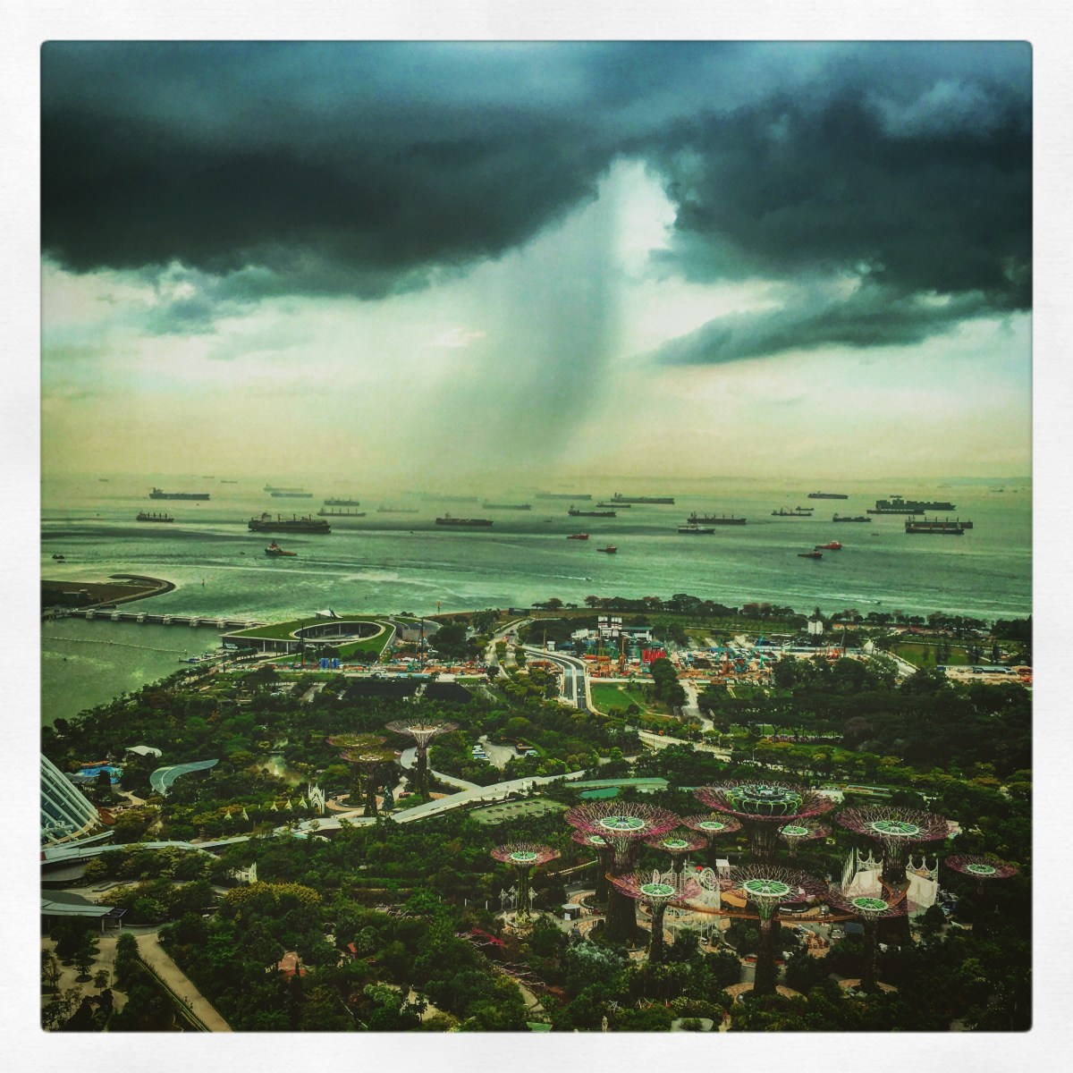 Freight Ships in Rainy Singapore Harbor