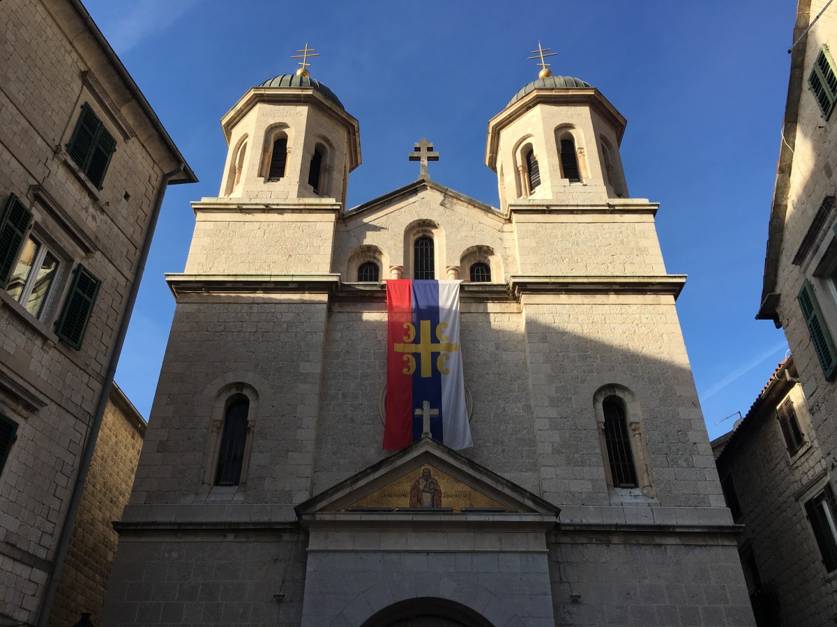 Flag of the Serbian Orthodox Church hanging in Kotor, Montenegro